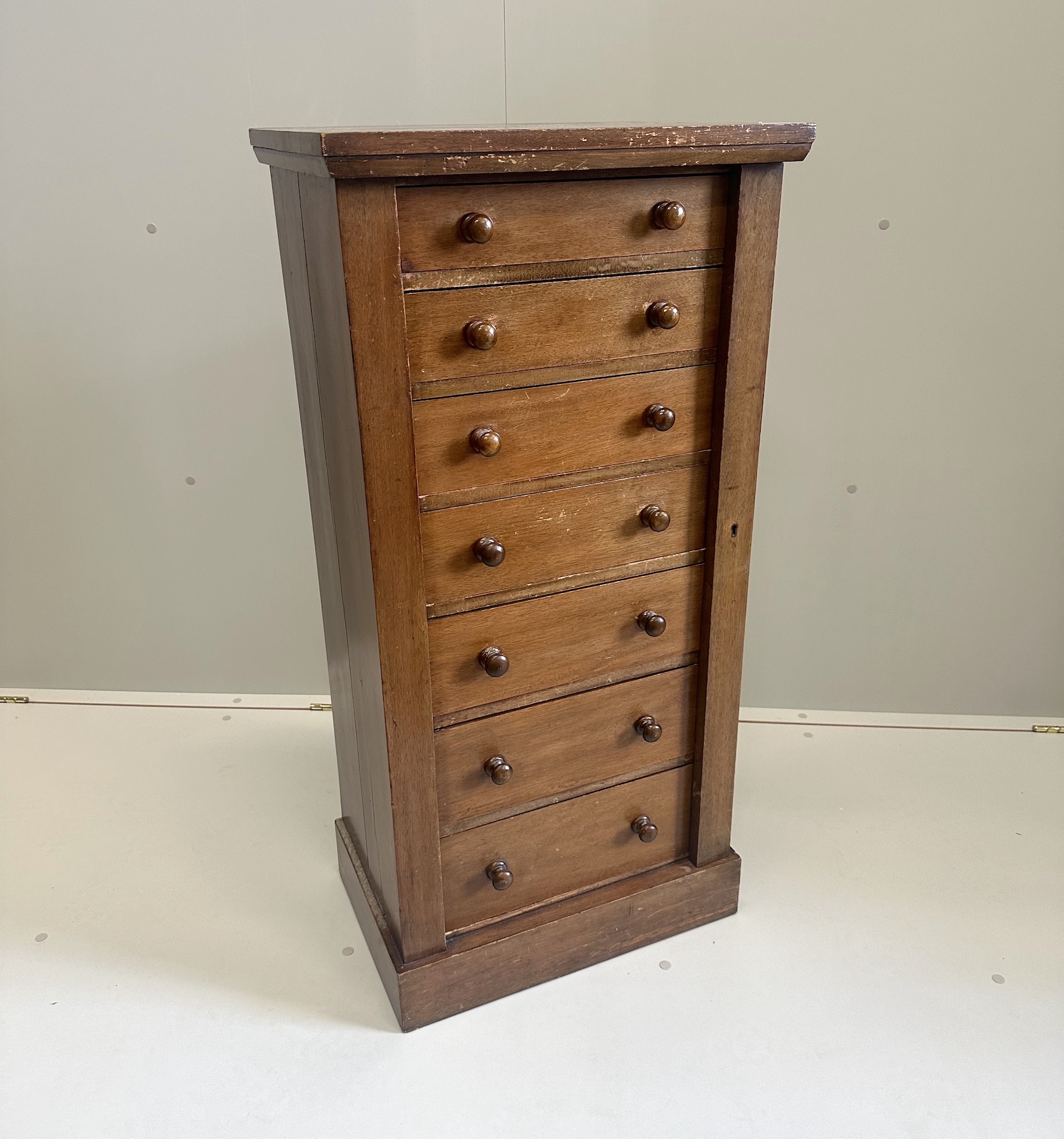 A late Victorian mahogany Wellington chest, width 51cm, depth 34cm, height 104cm
